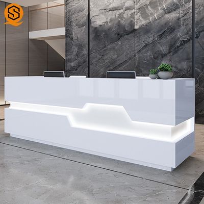 quality  LED Light White Salon Reception Desk With Solid Surface Material factory
